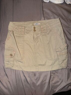 SO wear it declare it beige two-button fly cargo skirt